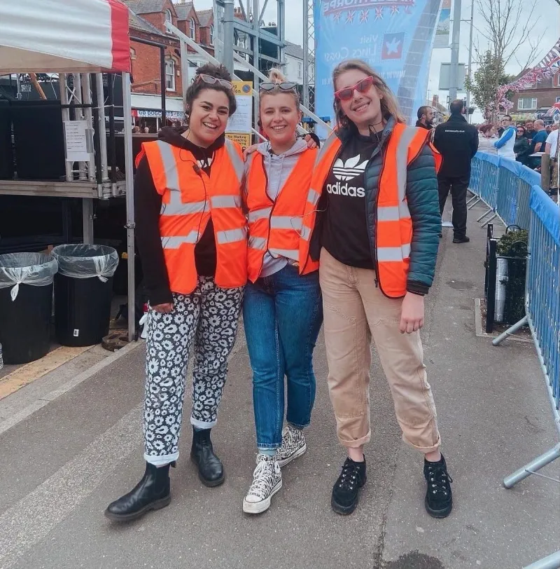 The Checkmate Productions team together at an event